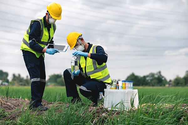 Two person taking Nitrate Samples